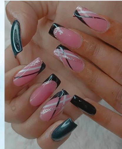 Black and pink nail extensions done at Glamin Salon
