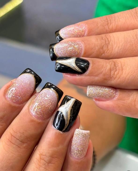 Black marble and gold glitter nail extensions